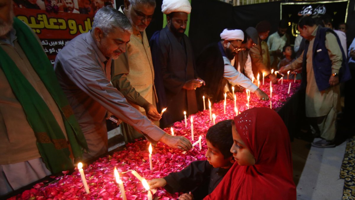 People light candles at a memorial for the victims of a mosque suicide bombing, Karachi, Pakistan, Feb. 10, 2026. (EPA Photo)