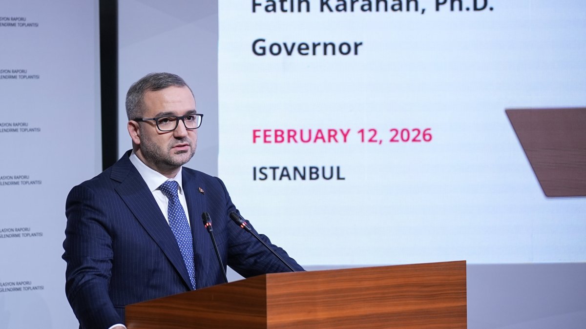 Central Bank of the Republic of Türkiye (CBRT) Governor Fatih Karahan delivers a presentation on this year's first inflation report, Istanbul, Türkiye, Feb. 12, 2026. (AA Photo)