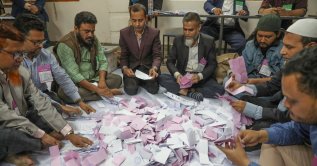 Bangladesh election officials count ballot papers after voting ends at the Barnamala Adarsha School and College polling centre in Dania, at Dhaka Government Muslim High School in Dhaka, Bangladesh, Feb.12, 2026. (EPA Photo)