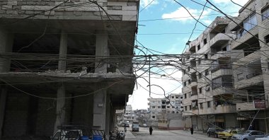Tangled overhead electric cables are pictured along the buildings in the neighborhood of Ain Tarma, Damascus, Syria, Jan. 29, 2026. (AFP Photo)