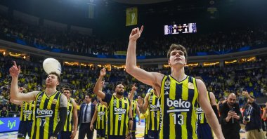 Fenerbahce Beko players celebrate with their fans after defeating Galatasaray MCT Technic in the Turkish Basketball Süper Lig match at Ulker Sports and Event Hall, Istanbul, Türkiye, Feb. 8, 2026. (AA Photo)