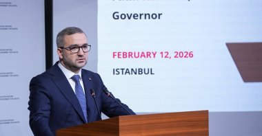 Central Bank of the Republic of Türkiye (CBRT) Governor Fatih Karahan delivers a presentation on this year's first inflation report, Istanbul, Türkiye, Feb. 12, 2026. (AA Photo)