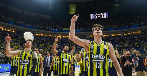 Fenerbahce Beko players celebrate with their fans after defeating Galatasaray MCT Technic in the Turkish Basketball Süper Lig match at Ulker Sports and Event Hall, Istanbul, Türkiye, Feb. 8, 2026. (AA Photo)