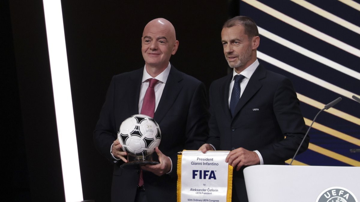 FIFA President Gianni Infantino (L) and UEFA President Aleksander Ceferin attend the 50th UEFA Ordinary Congress, Brussels, Belgium, Feb. 2026. (EPA Photo)