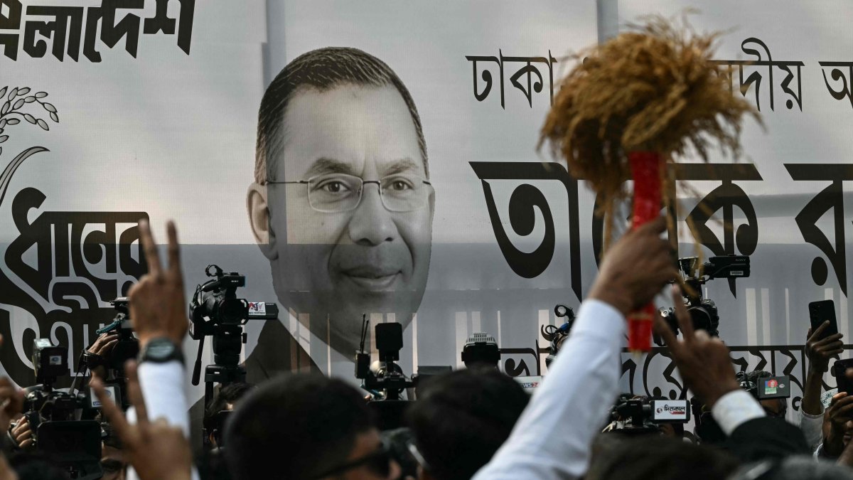 A poster of Bangladesh Nationalist Party chairman and election candidate Tarique Rahman is displayed as supporters gather outside the party office, Dhaka, Bangladesh, Feb. 13, 2026. (AFP Photo)