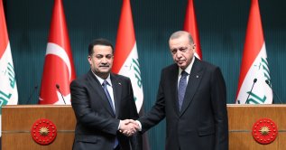 President Recep Tayyip Erdoğan shakes hands with Iraqi Prime Minister Mohammed S. Al Sudani during a meeting in the capital Ankara, Türkiye, March 22, 2023. (DHA File Photo)