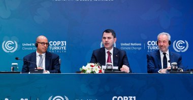 Environment, Urbanization and Climate Change Minister Murat Kurum (C) speaks next to United Nations Climate Change Executive Secretary Simon Stiell (L) and COP30 President Andre Correa do Lago (R) during a news conference, Istanbul, Türkiye, Feb. 12, 2026. (AFP Photo)