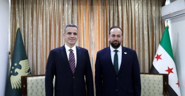 Presidential Communications Deputy Director Ferhat Pirinççi (L) meets with Syrian Information Minister Hamza Mustafa, Damascus, Syria, Feb. 12, 2026. (AA Photo)