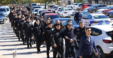 Turkish police escort suspects detained over FETÖ links to the courthouse, southern Antalya province, Türkiye, Feb. 24, 2025. (AA Photo)