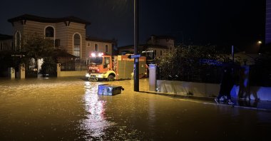 Heavy rainfall disrupts daily life as rising water levels in the Sarısu Stream cause flooding, Konyaaltı, Antalya, Türkiye, Jan. 26, 2026. (AA Photo)