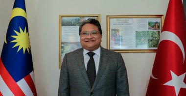 Malaysia’s Ambassador to Ankara Sazali Bin Mustafa Kemal participates in Anadolu Agency’s “Photos of the Year” vote, Ankara, Türkiye, Feb. 4, 2026. (AA Photo)