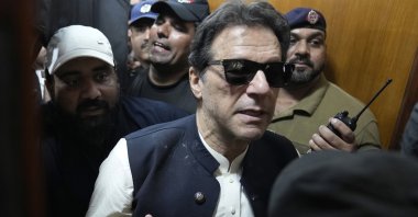 Former Pakistani Prime Minister Imran Khan (C) leaves court after an appearance, Lahore, Pakistan, May 19, 2023. (AP Photo)
