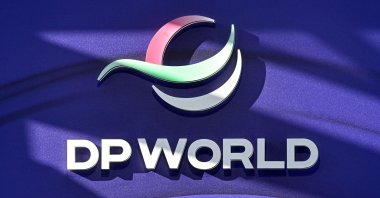 The logo of the multinational logistics company DP World is seen in the Alpine resort of Davos during the World Economic Forum (WEF) annual meeting, Switzerland, Jan. 20, 2026. (AFP Photo)