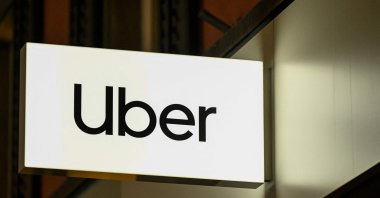 This photograph shows the logo of Uber during the World Economic Forum (WEF) annual meeting, Davos, Switzerland, Jan. 19, 2026. (AFP Photo)