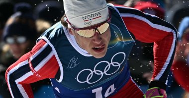 Norway's Johannes Hoesflot Klaebo competes during the cross-country men's 4 x 7.5-kilometer relay at the Milano Cortina 2026 Winter Olympics, in Lago di Tesero, Italy, Feb. 15, 2026. (AFP Photo)