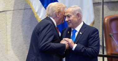 President Donald Trump talks with Israel's Prime Minister Benjamin Netanyahu at the Knesset, Jerusalem, Oct. 13, 2025. (Reuters Photo)