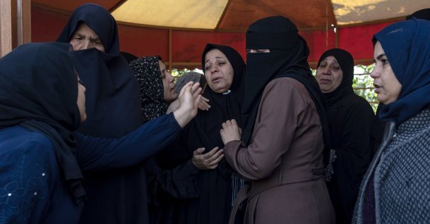 Palestinians mourn the death of loved ones in Israeli attacks in Khan Yunis, southern Gaza Strip, Feb. 15, 2026. (EPA Photo)