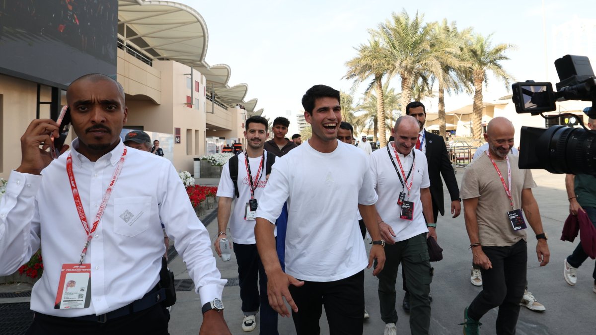 Spanish tennis player Carlos Alcaraz (C) tours during the Formula 1 pre-season testing at Bahrain International Circuit, Sakhir, Bahrain,  Feb. 12, 2026. (EPA Photo)