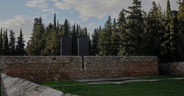 The execution wall at the Kaisariani Shooting Range where 200 Greek communist political prisoners were executed by Nazi forces on May 1, 1944, in the Kaisariani suburb of Athens, Feb. 16, 2026. (AP Photo)