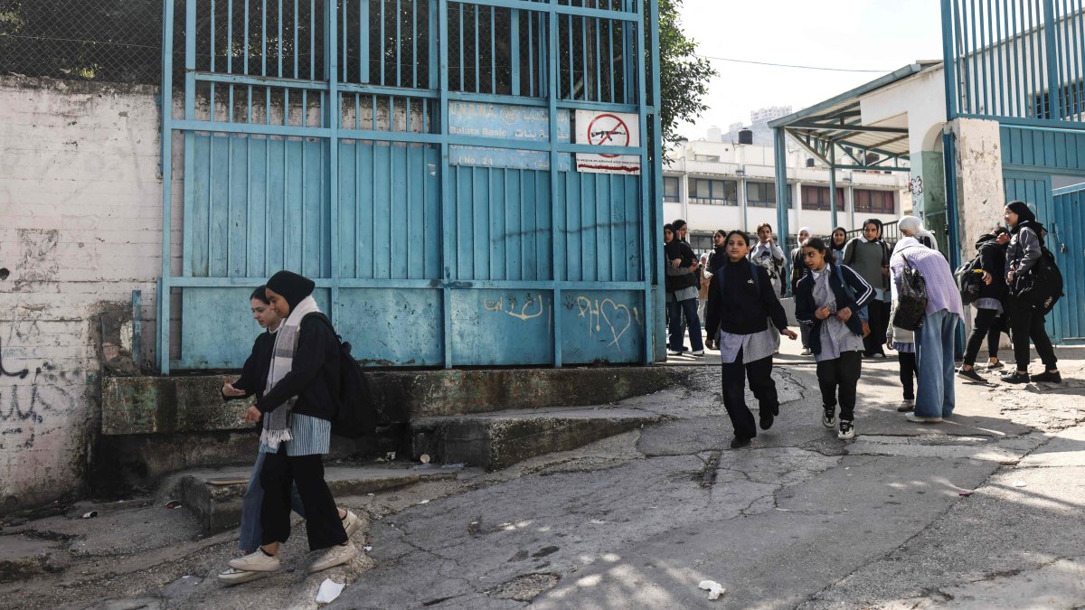 Students leave a U.N.-run school in the Balata camp for Palestinian refugees, on the eastern outskirts of Nablus, Israeli-occupied West Bank, Feb. 10, 2026. (AFP Photo)