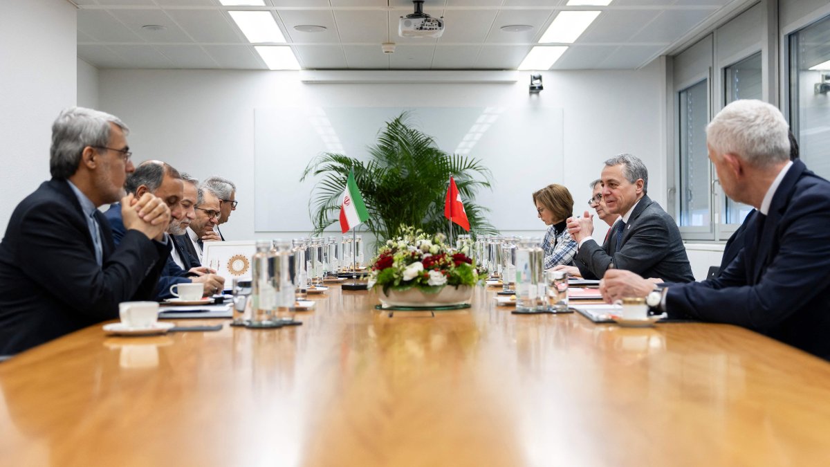 Iran's Foreign Minister Abbas Araghchi (3rd L) and Switzerland's Foreign Minister Ignazio Cassis (2nd R) attend a bilateral meeting between Switzerland and Iran during a second round of US-Iranian talks with U.S. in Geneva, Feb.17, 2026. (AFP Photo)