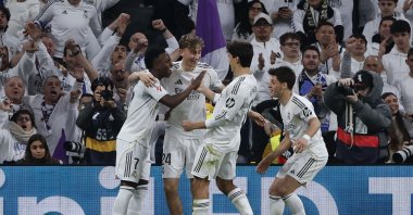 Real Madrid's Vinicius Jr (L) celebrates with his teammates after scoring the 4-1 goal during the La Liga match against Real Sociedad at the Santiago Bernabeu Stadium, Madrid, Spain, Feb. 14, 2026. (EPA Photo)