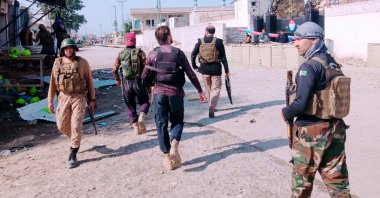 Pakistani security personnel inspect a blast site in Bannu district of Khyber Pakhtunkhwa province, Pakistan, Feb. 16, 2026. (DHA Photo)