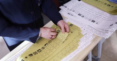 An official prepares ballot papers for the local elections, Istanbul, Türkiye, March 31, 2024. (EPA Photo)