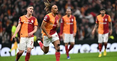 Galatasaray's French defender #93 Sacha Boey celebrates scoring his team's fifth goal during the UEFA Champions League, knockout round play-off 1st leg, football match between Galatasaray SK and Juventus FC at the Rams Park in Istanbul, Feb. 17, 2026. (AFP Photo)