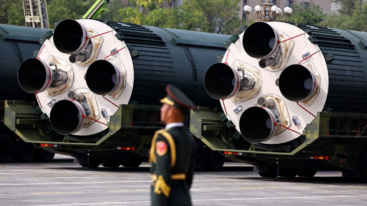 A PLA member stands gaurd as the strategic strike group displays DF-5C nuclear missiles in Beijing, China, Sept. 3, 2025. (Reuters Photo)