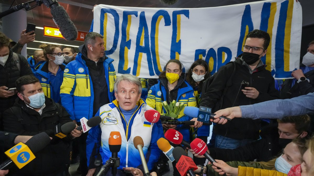 Valerii Sushkevych (C), president of Ukraine’s Paralympic Committee, speaks to journalists as he arrives with members of Ukraine’s Paralympic team at Warsaw Chopin Airport, Warsaw, Poland, March 15, 2022. (AP Photo)