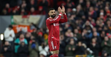 Liverpool's Mohamed Salah applauds the fans as he leaves the game, substituted during the English FA Cup fourth-round football match between Liverpool and Brighton and Hove Albion at Anfield, Liverpool, U.S., Feb. 14, 2026. (AFP Photo)