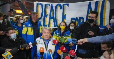 Valerii Sushkevych (C), president of Ukraine’s Paralympic Committee, speaks to journalists as he arrives with members of Ukraine’s Paralympic team at Warsaw Chopin Airport, Warsaw, Poland, March 15, 2022. (AP Photo)