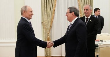 Russian President Vladimir Putin greets Cuban Foreign Minister Bruno Rodriguez Parrilla during their meeting at the Senate Palace of the Kremlin in Moscow, Russia, Feb. 18, 2026. (AFP Photo)