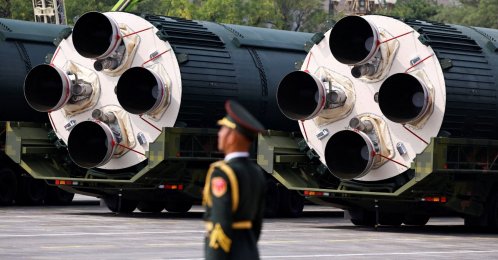 A PLA member stands gaurd as the strategic strike group displays DF-5C nuclear missiles in Beijing, China, Sept. 3, 2025. (Reuters Photo)
