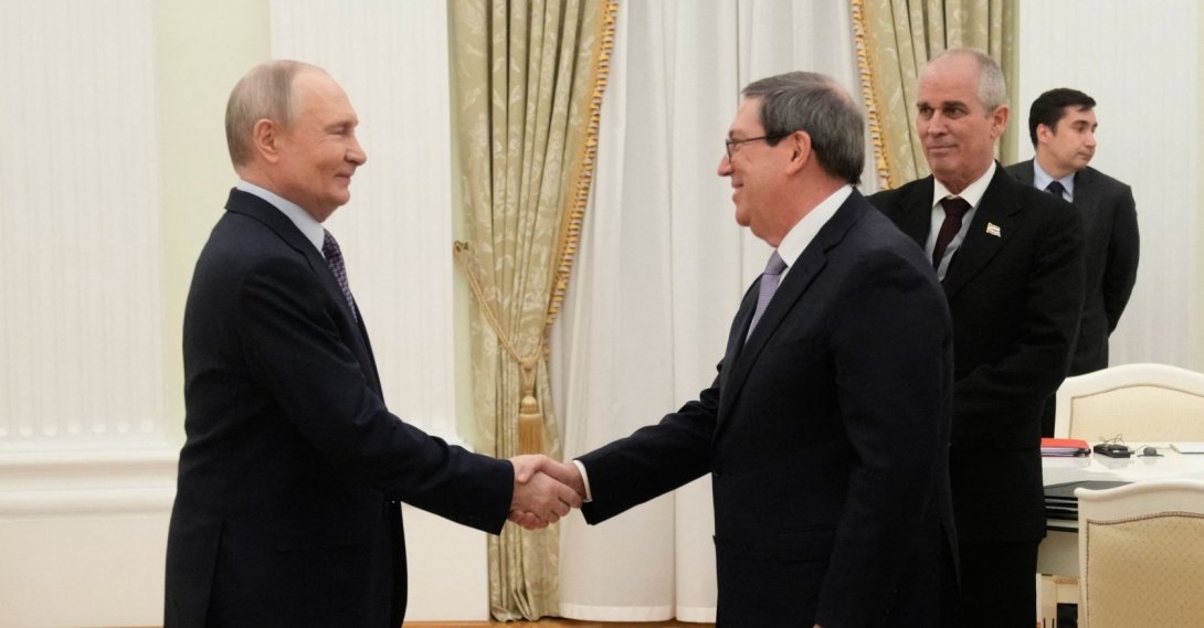 Russian President Vladimir Putin greets Cuban Foreign Minister Bruno Rodriguez Parrilla during their meeting at the Senate Palace of the Kremlin in Moscow, Russia, Feb. 18, 2026. (AFP Photo)
