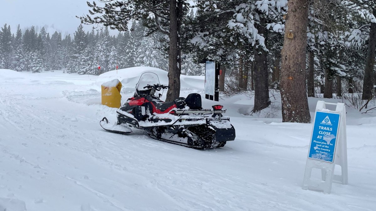 A snowmobile is parked at Alder Creek Adventure Center during a search after a Sierra Nevada avalanche near Truckee, California, U.S., Feb. 18, 2026. (Reuters Photo)