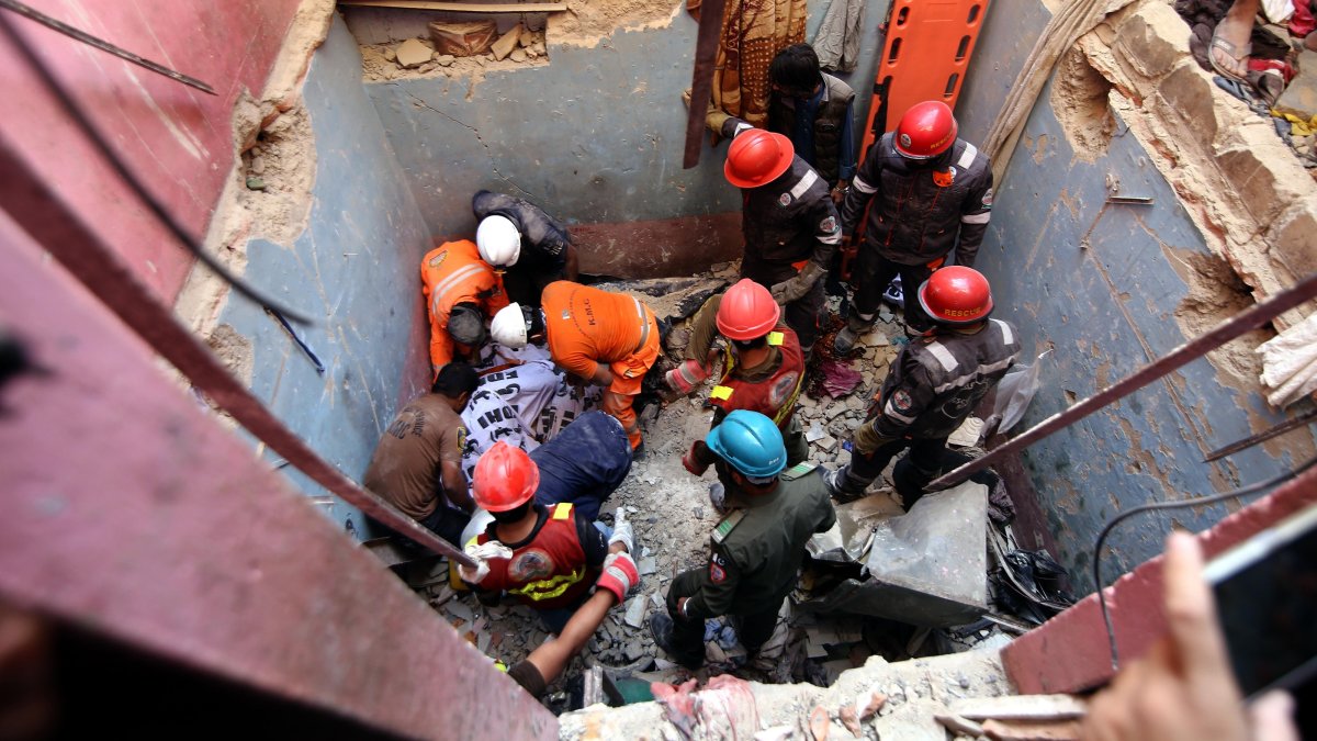 Pakistan building collapse caused by likely gas blast kills 16