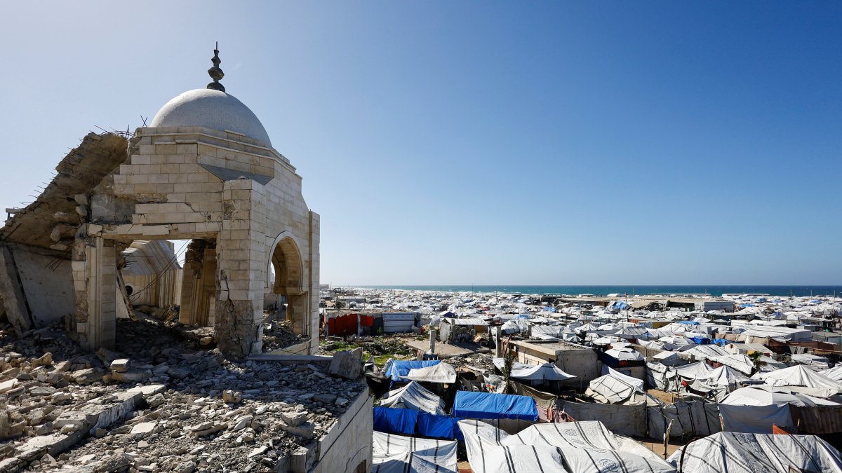 A mosque, destroyed during the two-year Israeli offensives, is surrounded by tents for displaced Palestinians, in Gaza City, Feb.11, 2026. (Reuters Photo)