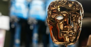 A British Academy of Film and Television Awards (BAFTA) mask, made at FSE Foundry, is displayed ahead of the annual awards ceremony, Braintree, U.K., Feb. 10, 2026. (Reuters Photo)