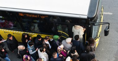 Passengers wait in line to board a city bus in Istanbul, Türkiye, in this undated photo. (Shutterstock Photo)