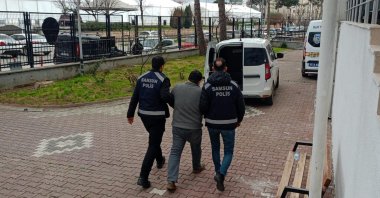Police arrest a man sentenced to eight years and nine months in prison for membership in the Gülenist Terror Group (FETÖ) in the Bafra district of Samsun province, Türkiye, Feb. 19, 2026. (AA Photo)