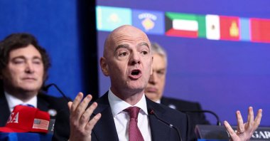 FIFA president Gianni Infantino speaks, as he and Argentina's President Javier Milei attend the inaugural Board of Peace meeting at the U.S. Institute of Peace, Washington, U.S., Feb. 19, 2026. (Reuters Photo)