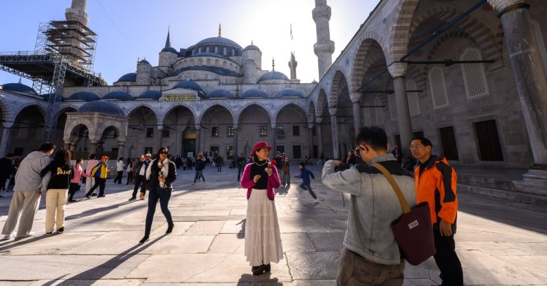 Tourists are seen in front of the historic Sultanahmet Mosque, Istanbul, Türkiye, Feb. 15, 2026. (AA Photo)