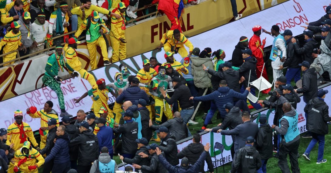 Senegal supporters clash with security services after a controversial penalty was awarded to Morocco late on during the Africa Cup of Nations final match between Senegal and Morocco, Rabat, Morocco, Jan. 18, 2026. (AP Photo)