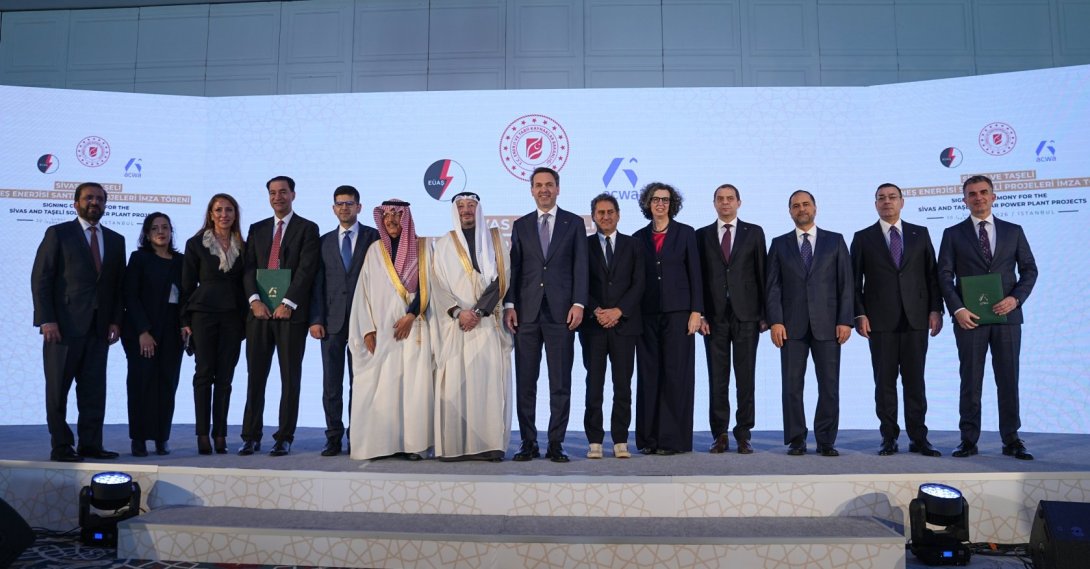 Energy and Natural Resources Alparslan Bayraktar (7th R), Acwa President Mohammed Abunayyan (6th L), Deputy Energy and Natural Resources Minister Zafer Demircan (4th R), Acwa Vice President Raad Al-Saady (4th L), Electricity Generation Company (EÜAŞ) General Manager Zafer Benli (2nd R) and Acwa Türkiye-Azerbaijan Country Manager Mehmet Selim Güven (R) attend the signing ceremony for the Sivas and Taşeli solar power plant projects, Istanbul, Türkiye, Feb. 20, 2026. (AA Photo)