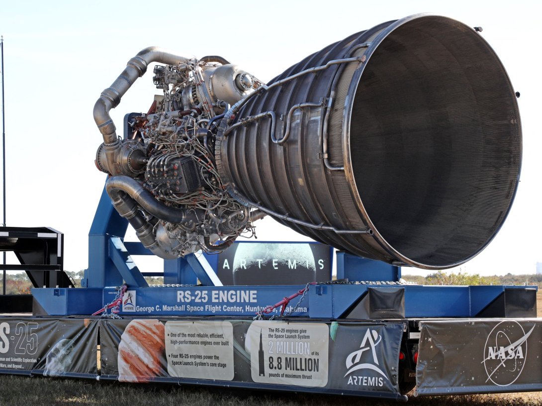 One of the massive RS-25 engines for NASA's Artemis II Space Launch System (SLS) rocket is displayed near the countdown clock at Kennedy Space Center in Cape Canaveral, Florida, Feb. 20, 2026. (AFP Photo)