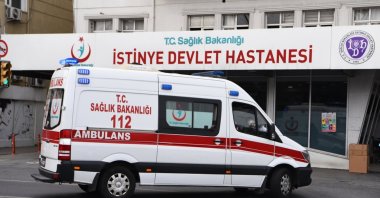 Istinye State Hospital with an ambulance parked in front, Istanbul, Türkiye, April 14, 2020. (Shutterstock Photo)