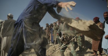 Taliban security officials and local residents inspect the scene of reported Pakistani airstrikes near the Pak-Afghan border in Nangarhar, Afghanistan, Feb. 22, 2026. (EPA Photo)