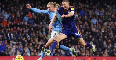 Manchester City's Erling Haaland in action with Newcastle United's Dan Burn during a Premier League match in Manchester, U.K., Feb. 21, 2026. (Reuters Photo)